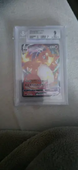 Beckett-graded 2020 Japanese Pokemon TCG Charizard VMAX card from the Starter... - Image 1