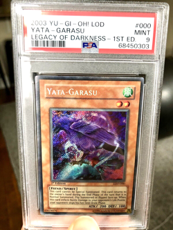 Yu-Gi-Oh! Yata-Garasu LOD-000 1st Edition SECRET Rare PSA 9 MINT - Image 1