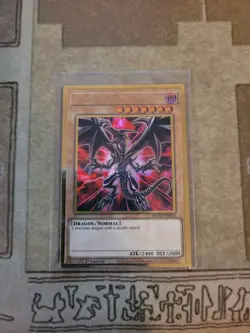 YUGIOH RED-EYES BLACK DRAGON MGED-EN003 GOLD 1ST ED NM ALT ART - Image 1