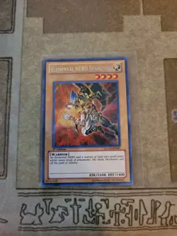 YUGIOH ELEMENTAL HERO SPARKMAN LCGX-EN007 SECRET 1ST ED NM ALT ART - Image 1