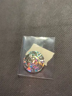 Chespin Cracked Ice Holo Pokemon Coin - Image 1