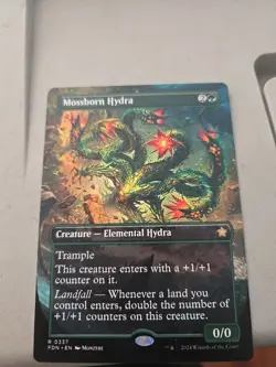 Mossborn Hydra (Borderless) Foundations Regular - Image 1
