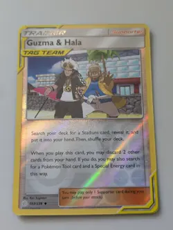 Guzma & Hala Tag Team Trainer 193/236 Reverse Holo Pokemon Card Cosmic Eclipse - Image 1