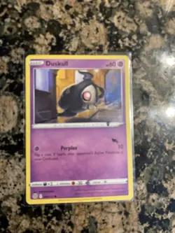 Duskull - 060/172 - Common - Reverse Holo - Near Mint Condition Pokemon Card - Image 1