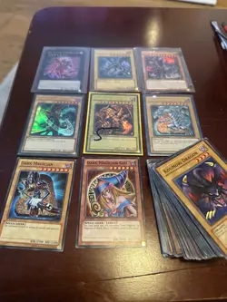 yugioh bulk cards around 150approx blue wyes white dragon red eyes dark magicia - Image 2