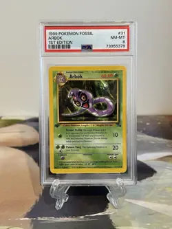 Pokemon Card 1st Edition Arbok - Fossil Set No. 31/62 - PSA 8 NM-MT - Image 1