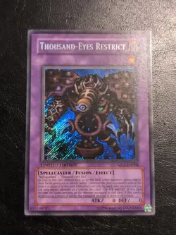 Yu-Gi-Oh! SECRET RARE HOLO CARD THOUSAND-EYES RESTRICT MC1-EN004 NM - Image 1