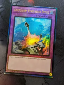YuGiOh Compulsory Evacuation Device Ultimate Rare 1st Edition RA01-EN069 - Image 1
