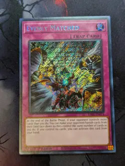 Evenly Matched - 1st Edition Secret Rare RA01-EN074 YuGiOh TCG Card - Image 1