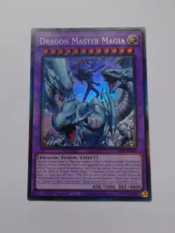 DRAGON MASTER MAGIA RA04-EN055 COLLECTOR'S RARE 1st Ed YUGIOH *NEW & MINT* - Image 1