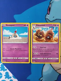 Sandygast 081/192 + Palossand 082/192 - Pokemon Rebel Clash, English - Image 1