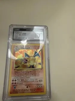 Pokemon Charizard Base Set Unlimited Holo Rare #4 CGC 7 - Image 1