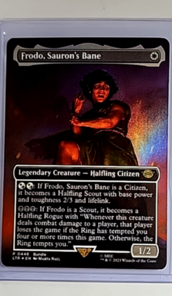 2023 MTG Magic The Gathering LOTR Borderless Foil Promo #448 Frodo Saurons Bane - Image 1