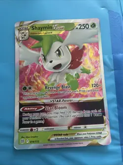Pokemon cards in pokemon binder. - Image 1