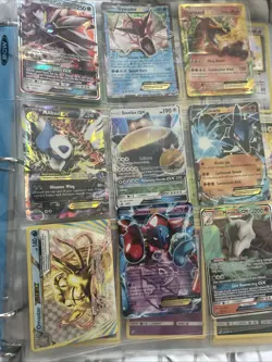 Pokemon cards in pokemon binder. - Image 2