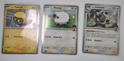 3x Cosmo Holo Pokemon Cards - Iono’s Tadbulb, Hop’s Wooloo & Dubwool - Image 2