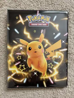 Pokemon TCG Paldean Fates Ultra PRO 9-Pocket Portfolio w/ Shiny Pikachu - Image 1