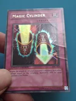 Yugioh - Magic Cylinder Ultra Rare IOC-SE2 Damaged - Image 1