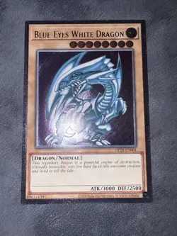 Yugioh OP28-EN001 Blue-Eyes White Dragon Ultimate Rare Euro NM purple cleanest - Image 1