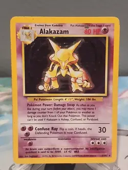 Alakazam 1/102 Holo Rare Base Set Pokemon Card Heavy Play/Damaged - Image 1