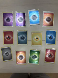 Lot Of 12 Pokemon TCG Holo Energies From SWSH Era - Image 1