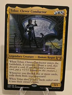 Toluz, Clever Conductor MTG Streets of New Capenna Regular - Image 1
