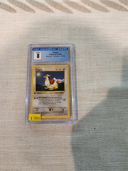 Pokemon TCG Base Set 1st Edition Pidgey, CGC Graded 8, NM/Mint! - Image 1