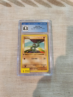 Pokemon TCG Machop 1st Edition Base Set, CGC graded 8.5, NM/Mint+! - Image 1