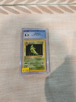 Pokemon TCG Base Set 1st Edition Metapod, CGC graded 8.5, NM/Mint+! - Image 1