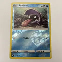Pokemon TCG Shellder Sun & Moon Base Set 33/149 Reverse Holo Common card - Image 1