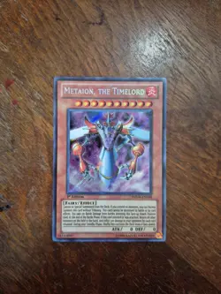 Yugioh Metaion, The Timelord PHSW-EN098 Secret Rare 1st Ed LP - Image 1