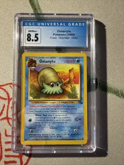 1999 POKEMON FOSSIL UNLIMITED #52 OMANYTE CGC 8.5 - Image 1