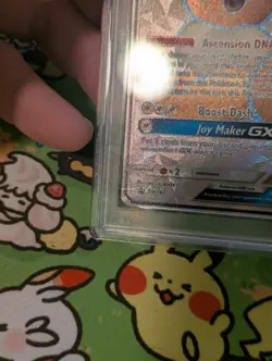 Pokemon TCG 2020 Pokemon SM Black Star Promo Eevee GX #SM242 PSA 9 - Image 2