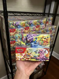 Pokemon TCG Prismatic Evolutions Mini Tin - Full Set of 8 Sealed Tins - Image 1