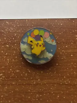 2021 Official Pokemon Celebrations 25th Anniversary Flying + Surfing Pikachu Pin - Image 1