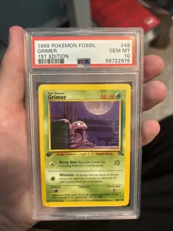 PSA 10 1999 First Edition Fossil Pokemon Grimer 48/62 - Image 1