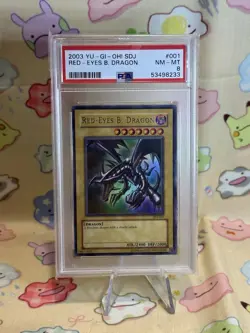 PSA 8 2003 Yu-Gi-Oh! Red-Eyes Black Dragon SDJ-001 - Image 1