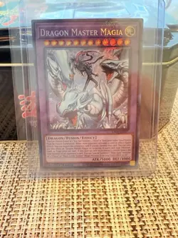 Dragon Master Magia Yugioh RA04-EN55 Ultimate Rare 1st Edition (GM to PERFECT) - Image 1