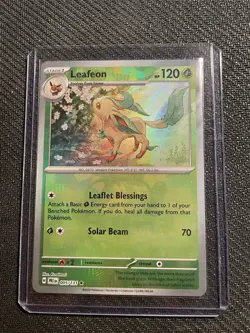 Pokemon TCG Leafeon Prismatic Evolutions Holo Card 005/131 Master Ball Pattern - Image 1