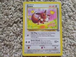 Off Center Eevee Pokemon Card TCG 1999 Jungle Unlimited Vintage 51/64 Sleeve NM - Image 1