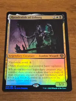 MTG Dominaria United - Ratadrabik of Urborg - DMU 213 - FOIL - Image 1