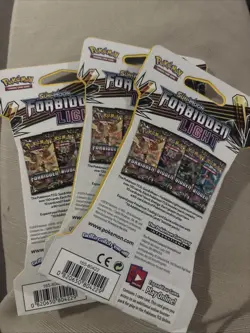 Pokemon Sun & Moon Forbidden Light 3 Sleeved Booster Pack Sealed - Image 2