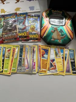 Pokemon Card Mixed Lot: 5 SEALED Packs, 40+ Cards, 1 Poster, 1 Empty ETB & Tin - Image 4