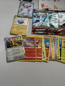 Pokemon Card Mixed Lot: 5 SEALED Packs, 40+ Cards, 1 Poster, 1 Empty ETB & Tin - Image 5