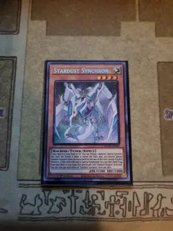 YUGIOH TCG STARDUST SYNCHRON DAMA-EN002 SECRET 1ST EDITION NM - Image 1