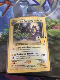 HOLO Light Toxtricity SWSH137 NM - PROMO Celebrations Sword Shield Pokemon Card - Image 1