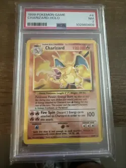 1999 Pokemon TCG Charizard Base Set Holo Rare PSA 7 - Image 1