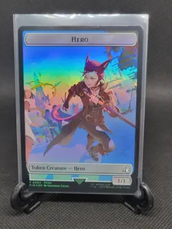 Hero (0003) | Treasure (0023) Double-Sided Token - Foil - MTG: Final Fantasy FIN - Image 1