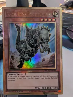 YuGiOh! Fossil Dyna Pachycephalo MGED-EN008 Gold Rare 1st Ed - Image 1