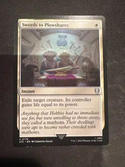 Swords to Plowshares - 0178 LTC MTG - Uncommon N/M - Food & Fellowship - Image 1